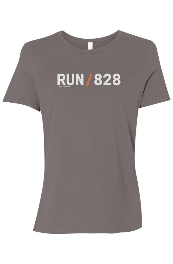 light grey shirt with words RUN / 828 in white with orange slash separating the words
