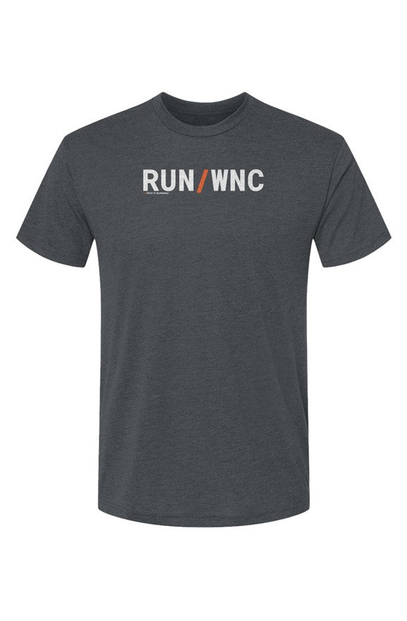 indigo shirt with words RUN / WNC in white with orange slash separating the words