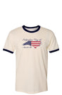 Cream t-shirt with blue cuffs and collar featuring an outline of north Carolina filled with parts of the American flag. The graphic is surrounded by 'Independence Day 5k' and 'Asheville, NC' in ornate text
