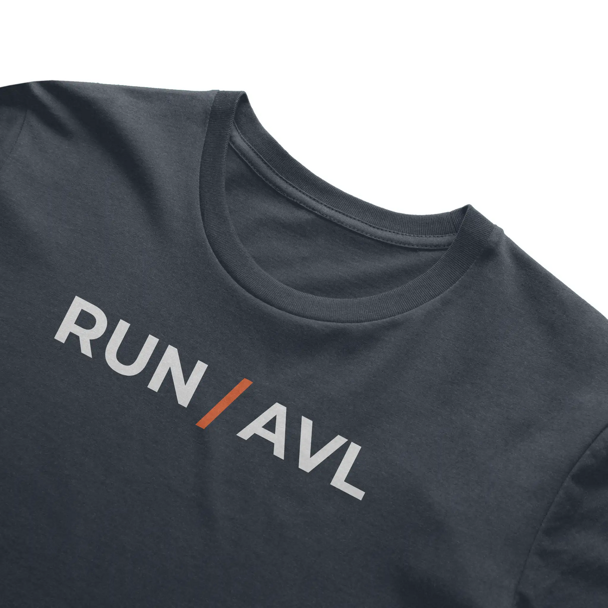 dark grey shirt with words RUN / AVL in white with orange slash separating the words