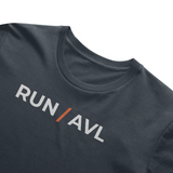dark grey shirt with words RUN / AVL in white with orange slash separating the words