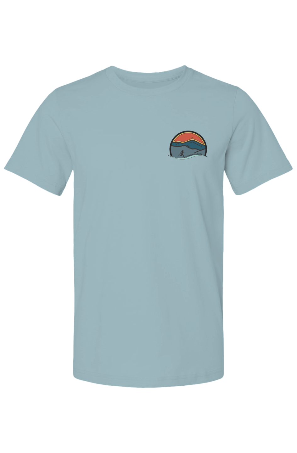 front of light blue t-shirt and on left chest a small Run Asheville logo featuring a circular emblem with layered mountain ridges in teal and slate blue tones beneath a warm red-orange sky with a golden horizon. A silhouette of a runner strides across the foreground, with a flowing light teal wave element at the base of the circle and the URL "RUNASHEVILLE.COM" arced across the lower interior.
