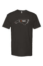 black t-shirt with white North Carolina outline graphic surrounding 'I RUN NC' text with the word 'RUN' replaced by a silhouetted male runner in orange