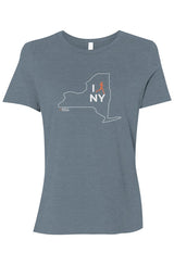 blue t-shirt with white New York outline graphic surrounding 'I RUN NY' text with the word 'RUN' replaced by a silhouetted female runner in orange