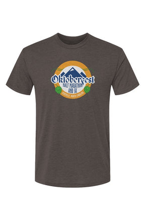 brown t-shirt with Oktoberfest Half Marathon & 5k logo with blue mountains, green hops in a gold ring on a white background