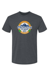 charcoal color t-shirt with Oktoberfest Half Marathon & 5k logo with blue mountains, green hops in a gold ring on a white background