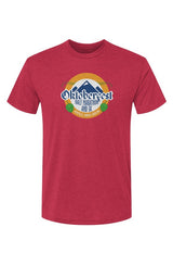 Red t-shirt with Oktoberfest Half Marathon & 5k logo with blue mountains, green hops in a gold ring on a white background