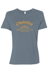 light blue t-shirt with 'Oktoberfest Half Marathon & 5k Asheville NC' text in gold surrounding an outline of wheat and hops