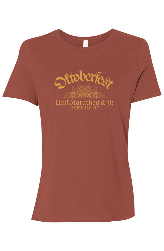 orange t-shirt with 'Oktoberfest Half Marathon & 5k Asheville NC' text in gold surrounding an outline of wheat and hops.