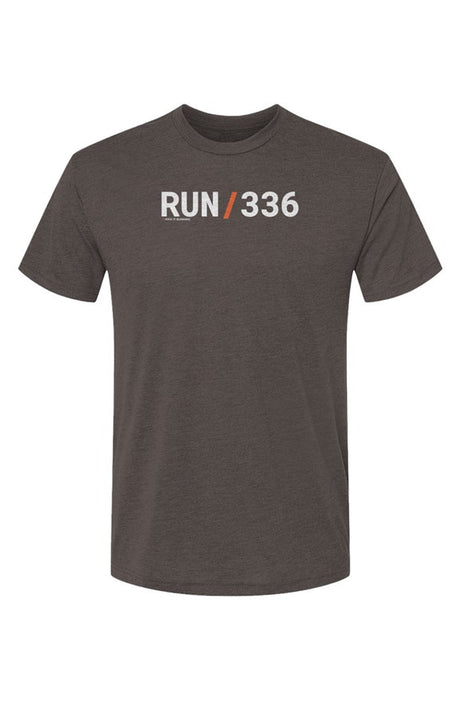brown shirt with words RUN / 336 in white with orange slash separating the words