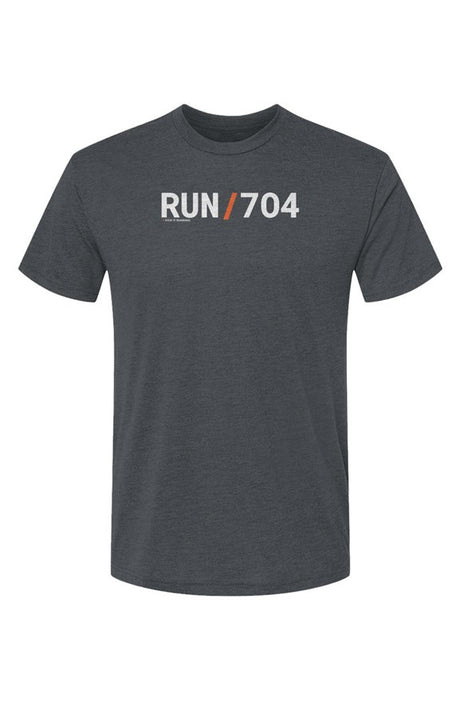 indigo shirt with words RUN / 704 in white with orange slash separating the words