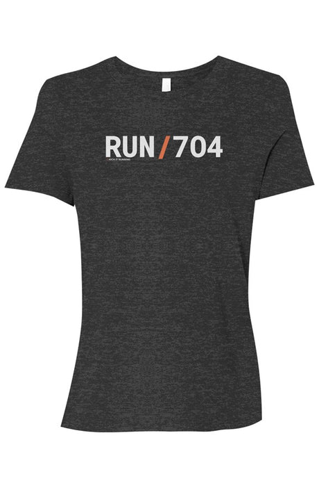 dark grey shirt with words RUN / 704 in white with orange slash separating the words