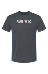 indigo shirt with words RUN / 910 in white with orange slash separating the words