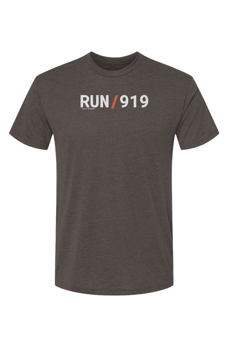 brown shirt with words RUN / 919 in white with orange slash separating the words