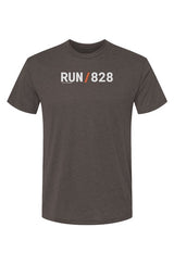 brown shirt with words RUN / 828 in white with orange slash separating the words