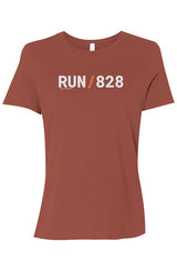 brown shirt with words RUN / 828 in white with orange slash separating the words