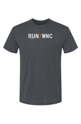indigo shirt with words RUN / WNC in white with orange slash separating the words