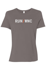 light grey shirt with words RUN / WNC in white with orange slash separating the words