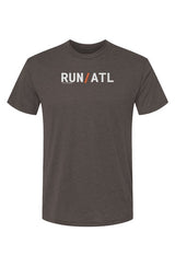 brown t-shirt with words RUN / ATL in white with orange slash separating the words