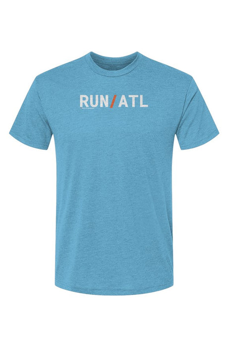 blue t-shirt with words RUN / ATL in white with orange slash separating the words