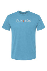 blue t-shirt with words RUN / 404 in white with orange slash separating the words