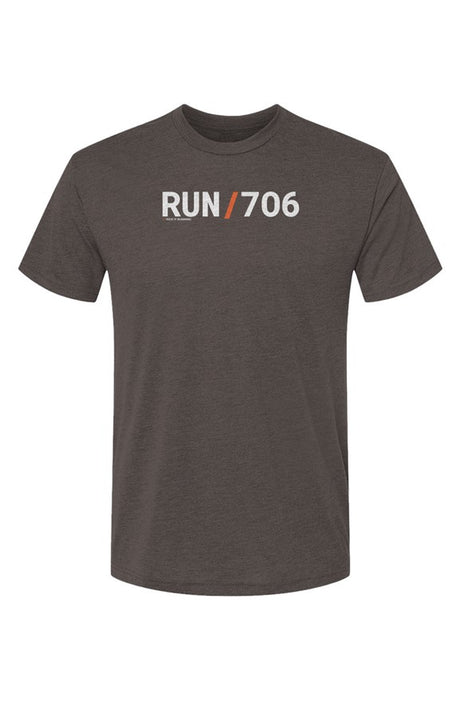 brown t-shirt with words RUN / 706 in white with orange slash separating the words