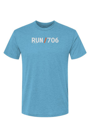 blue t-shirt with words RUN / 706 in white with orange slash separating the words