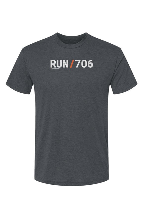 indigo blue t-shirt with words RUN / 706 in white with orange slash separating the words