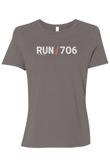 brown t-shirt with words RUN / 706 in white with orange slash separating the words