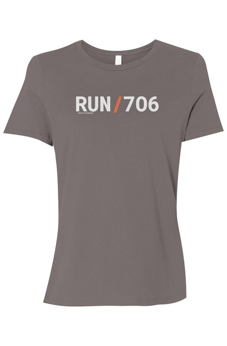 brown t-shirt with words RUN / 706 in white with orange slash separating the words