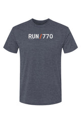 slate blue t-shirt with words RUN / 770 in white with orange slash separating the words