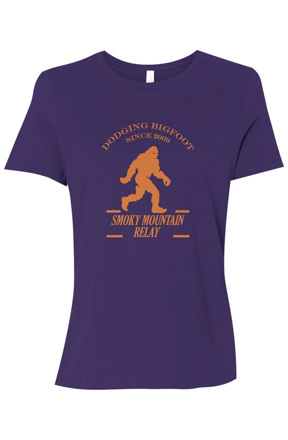 purple t-shirt with an orange graphic of Bigfoot and Smoky Mountain Relay in text below it