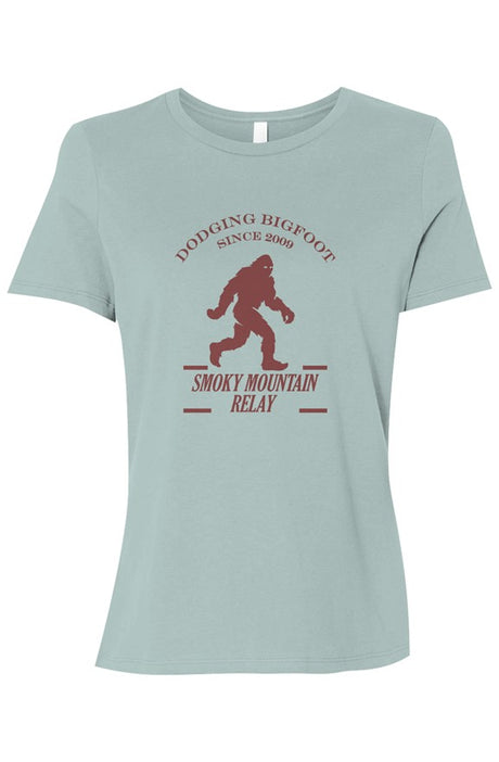 light blue t-shirt with a maroon graphic of Bigfoot and Smoky Mountain Relay in text below it