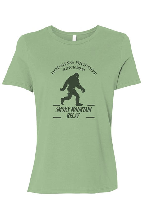 green t-shirt with a dark green graphic of Bigfoot and Smoky Mountain Relay in text below it